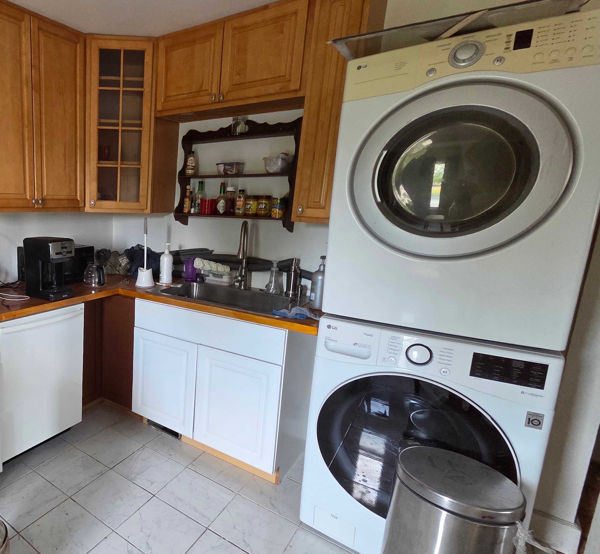 Ugly Kitchen kitchen and stacked laundry